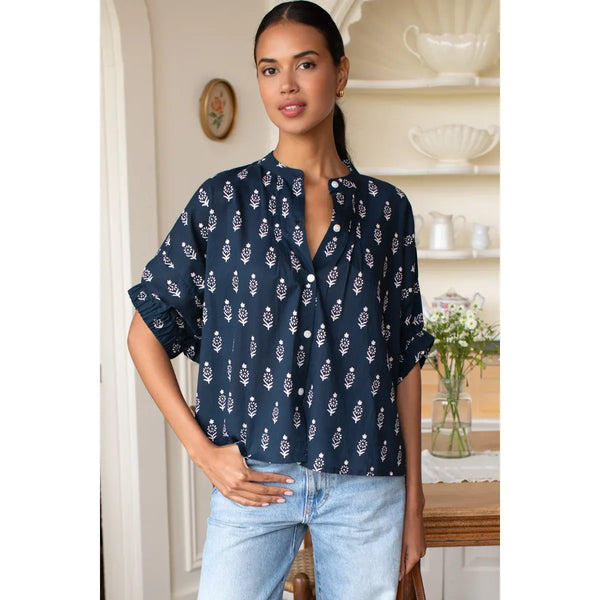 Model wearing Emerson Fry Mandarin Collar Top in Marguerite Blue 2 Organic, front view with button placket and batwing sleeves