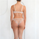 White lace lingerie set on a white background