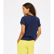 Woman wearing a navy blue t-shirt and yellow pants on a white background