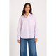 a woman wearing a purple and white button up stripe shirt on a white background