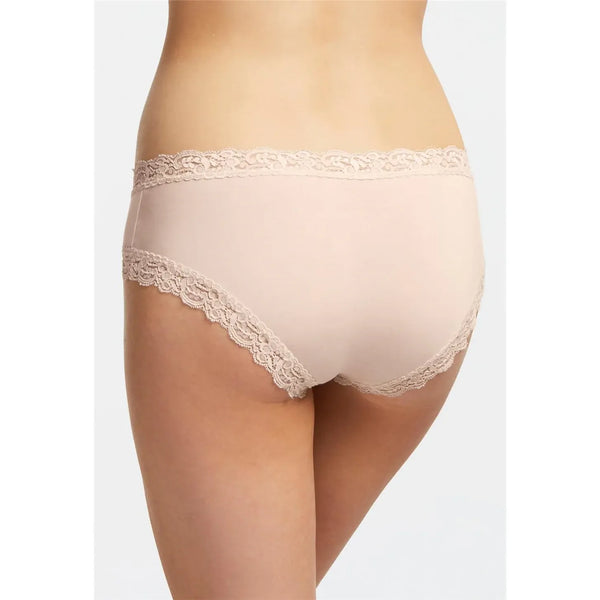 Beige lace-trimmed underwear on a plain background