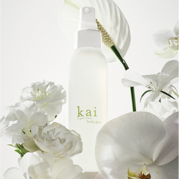 White 'kai' body mist bottle with flowers on a light background