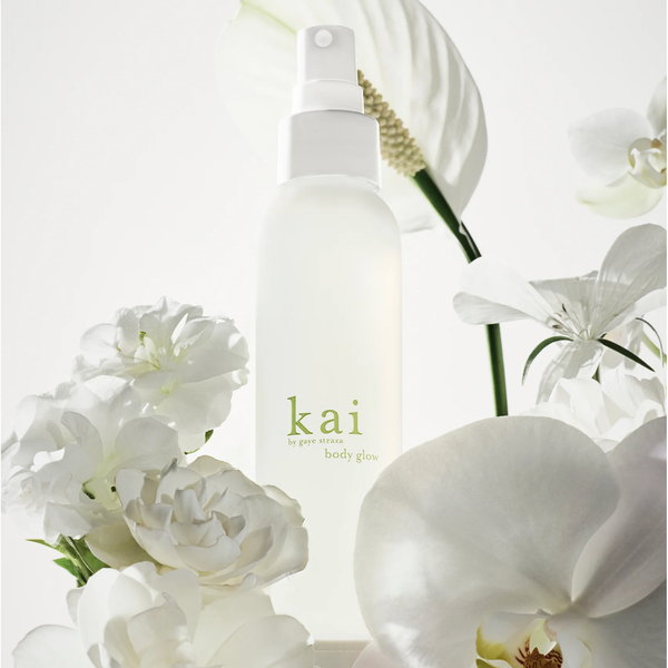 White 'kai' body mist bottle with flowers on a light background