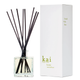 Kai home reed diffuser with black sticks and white packaging on a white background