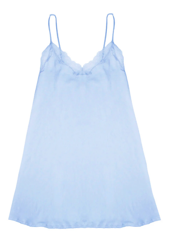 Light blue slip dress with thin straps on a white background