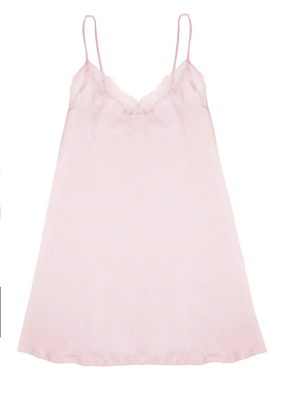 Light pink slip dress on a white background