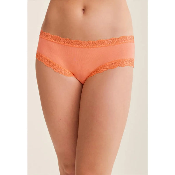 Orange lace underwear on a beige background